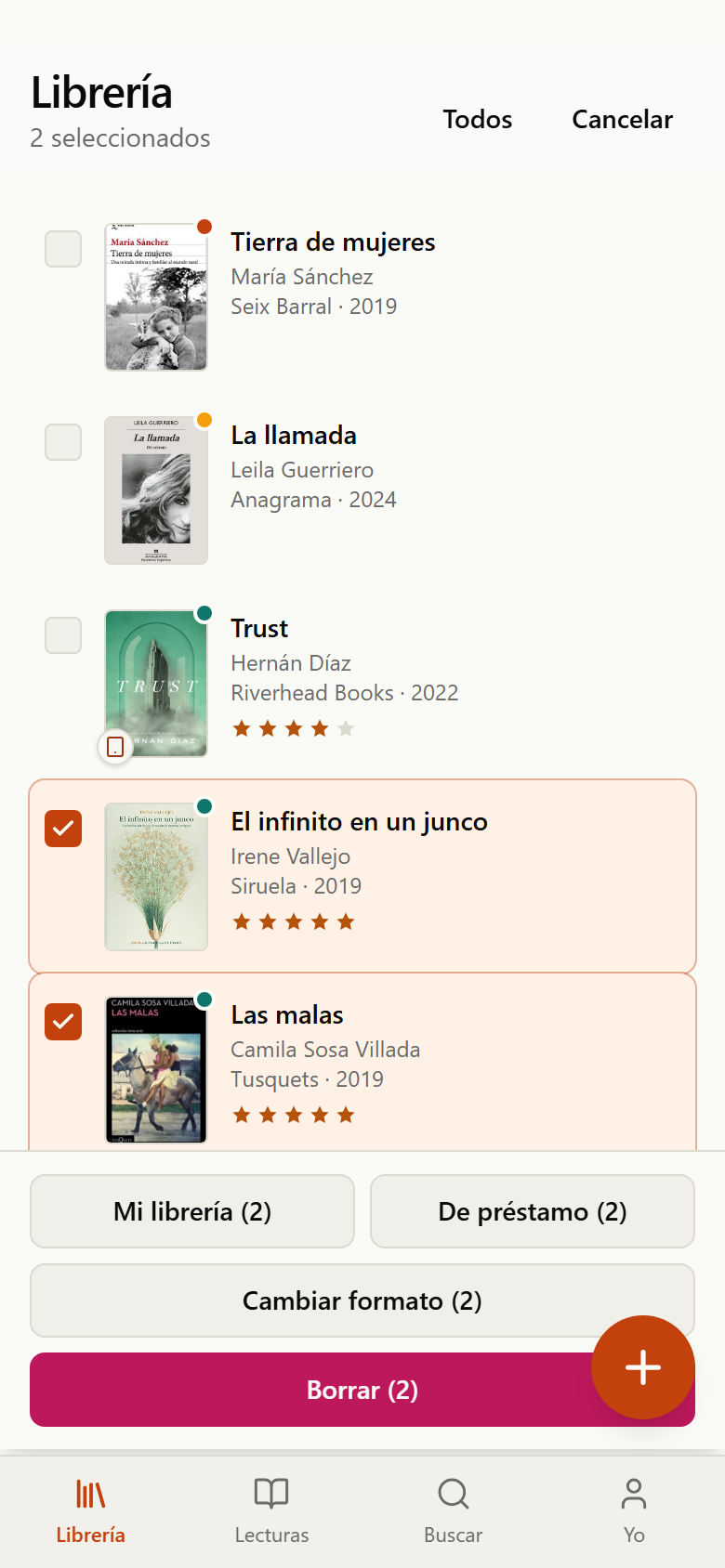 Librería en modo selección con dos libros marcados y la barra inferior de acciones en bloque